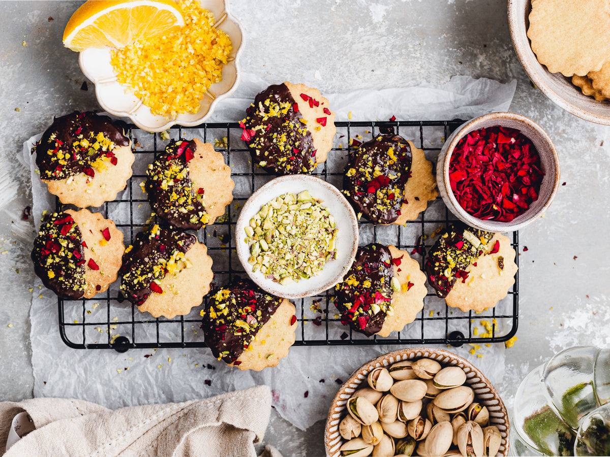 Rose, orange &amp; pistachio shortbread with a rich dark chocolate glaze &ndash; Tala Cooking